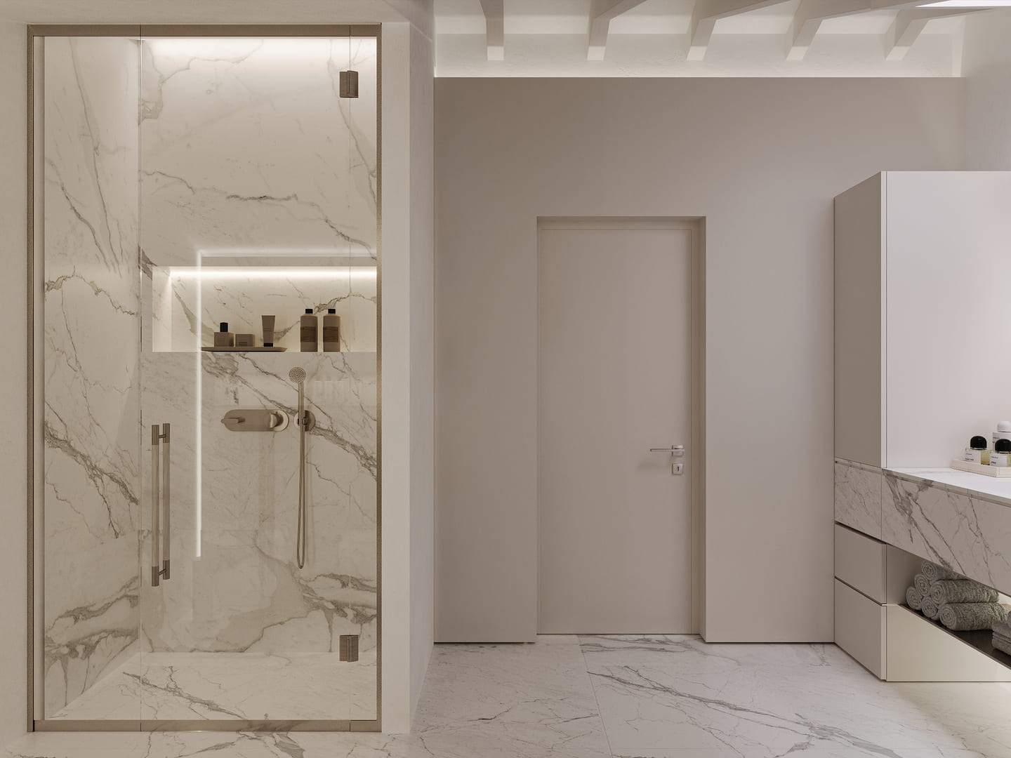 This is an image of a modern bathroom with marble walls and flooring, a glass shower enclosure, sleek vanity storage, and neutral color tones, emphasizing clean lines and luxury.