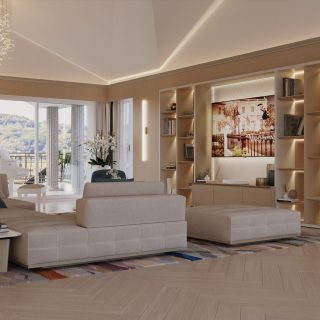 An airy and well-lit living room featuring a grand piano, a cascading light fixture, a sectional sofa, and shelving units, with a scenic backdrop visible through large windows.